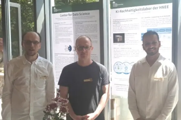 Brandenburg AI Day 2024 Three people stand in front of their posters on the topic of AI and data science